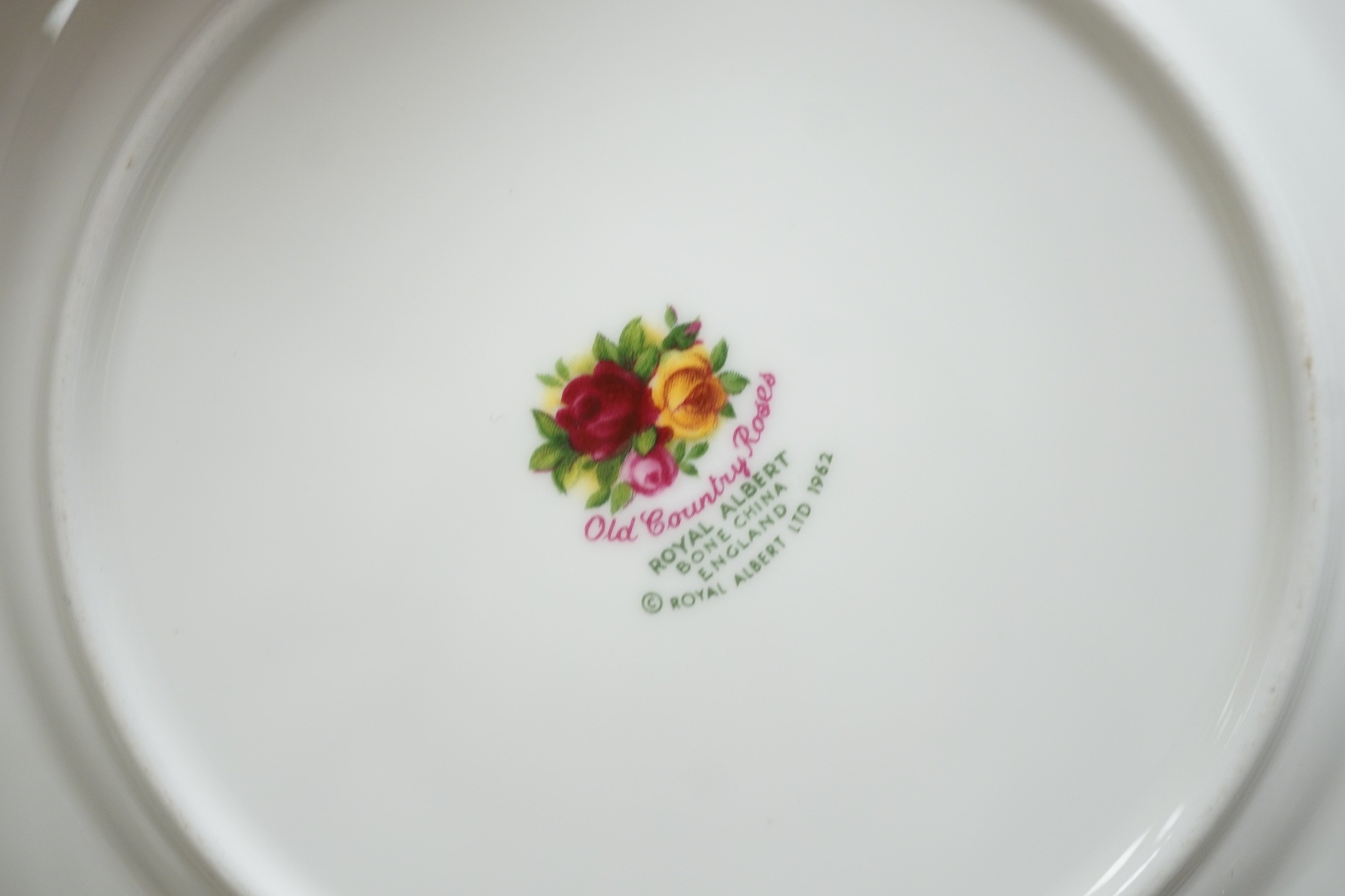 Six Royal Crown Derby coffee cans and saucers and a Royal Albert Country Roses dish and cover